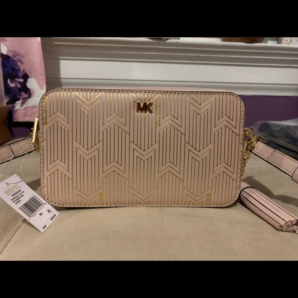 Michael Kors crossbody purse.
